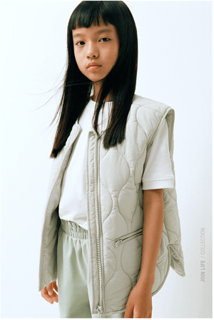 Asian girl with puffy vest