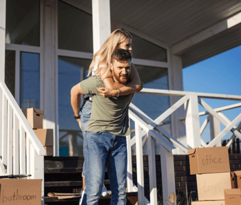 Is it Time to Stop Renting and Buy Your First Home? Couple Moving Image